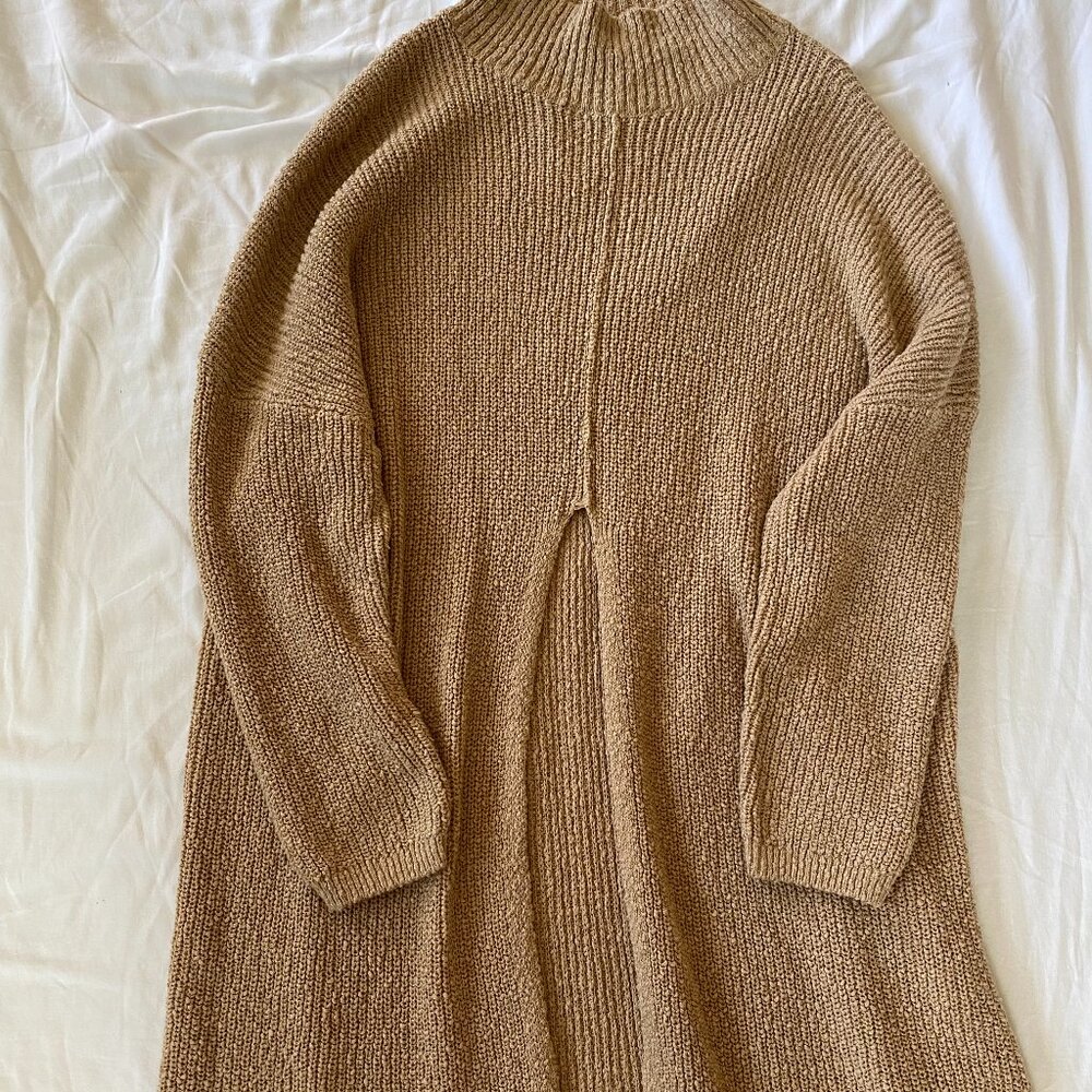 New with tags FP beach chunky sweater with slit & small turtleneck tan Size:XS.